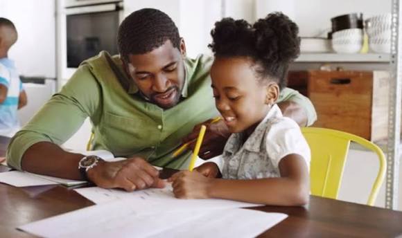 Homeschooling teacher with student
